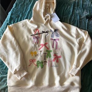 Aelfric Eden Cream Hoodie with Multicolor Bow Patterns